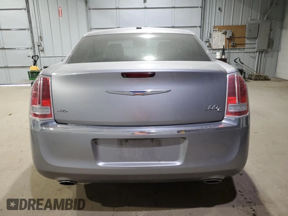 2014 Chrysler 300 C with VIN 2C3CCAKTXEH383941, listed as a Copart auction lot 41703475 with 105,709 mi miles and Salvage Title. Bid and sale history available at DreamBid. Image 6.