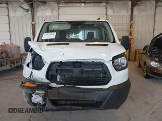 2019 Ford Transit with VIN 1FTYE1YM0KKB77849, listed as a IAAI auction lot 42175880 with 151,828 mi miles. Bid and sale history available at carsss.com. Image 11.