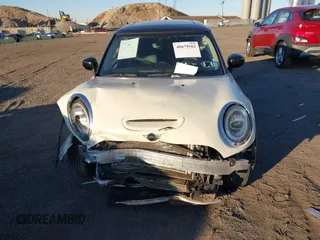 2020 MINI Hardtop Cooper S z VIN WMWXR5C00L2L49498, wystawiony jako IAAI lot #40679562 z przebiegiem 48 387 mil mil oraz . Historia ofert i sprzedaży dostępna na DreamBid. Obrazek 12.
