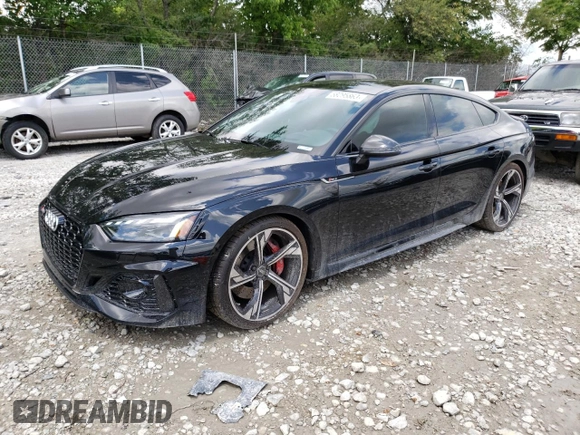 2023 Audi RS 5 Sportback z VIN WUAAWCF5XPA900600, wystawiony jako Copart lot #58295863 z przebiegiem 4808 mil mil oraz . Historia ofert i sprzedaży dostępna na DreamBid. Obrazek 1.