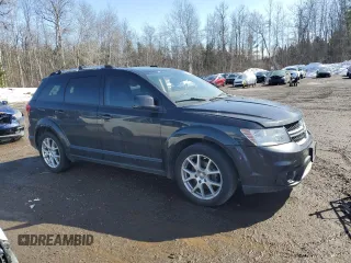 2013 Dodge Journey Crew with VIN 3C4PDCCG8DT701083, listed as a Copart auction lot 48292095 with 129,494 mi miles and Clean title. Bid and sale history available at DreamBid. Image 4.