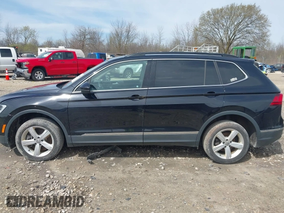 2021 Volkswagen Tiguan SE with VIN 3VV2B7AX4MM050282, listed as a IAAI auction lot 42124808 with 80,082 mi miles and . Bid and sale history available at DreamBid. Image 15.
