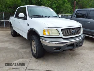 2002 Ford F-150 XLT with VIN 1FTRW08L02KE29411, listed as a IAAI auction lot 42133550 with 270,752 mi miles. Bid and sale history available at carsss.com. Image 1.