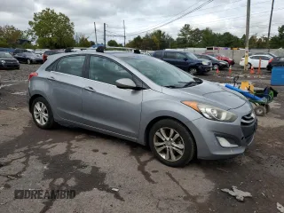 2013 Hyundai Elantra GT with VIN KMHD35LE0DU032356, listed as a Copart auction lot 73402554 with 215,625 mi miles and Salvage Title. Bid and sale history available at carsss.com. Image 4.
