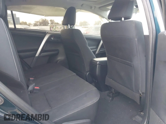 2018 Toyota RAV4 XLE with VIN JTMWFREV2JJ151595, listed as a IAAI auction lot 41380691 with 79,515 mi miles and . Bid and sale history available at carsss.com. Image 8.