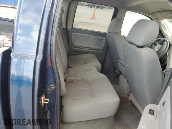 2005 Dodge Dakota SLT with VIN 1D7HE48NX5S308595, listed as a Copart auction lot 56713434 with 257,419 mi miles and Salvage Title. Bid and sale history available at DreamBid. Image 10.