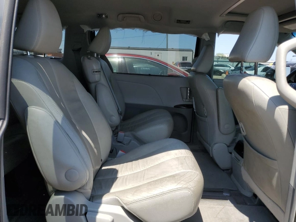 2013 Toyota Sienna XLE AAS с VIN 5TDYK3DC1DS349139, выставлен на аукционе Copart как лот 64239914 с пробегом 127 874 миль миль и Списание • Salvage title. История ставок и продаж доступна на DreamBid. Изображение 11.