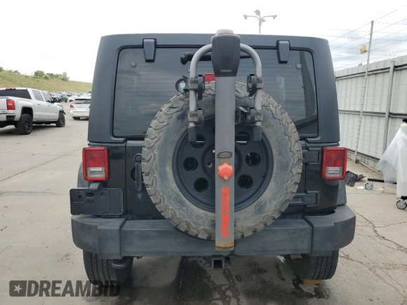 2013 Jeep Wrangler Unlimited Sport with VIN 1C4BJWDG0DL560265, listed as a Copart auction lot 58444045 with 111,354 mi miles and Salvage title. Bid and sale history available at DreamBid. Image 6.