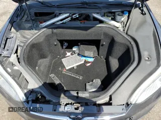 2014 Tesla Model S 60 z VIN 5YJSA1H17EFP36595, wystawiony jako Copart lot #53705035 z przebiegiem 148 254 mil mil oraz Szkoda całkowita • Salvage title. Historia ofert i sprzedaży dostępna na DreamBid. Obrazek 11.