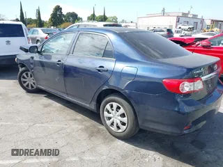 2013 Toyota Corolla L with VIN 5YFBU4EE0DP106114, listed as a IAAI auction lot 42039913 with 184,518 mi miles and . Bid and sale history available at DreamBid. Image 14.
