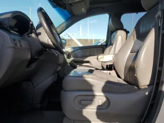 2009 Honda Odyssey EX-L with VIN 5FNRL38619B044063, listed as a Copart auction lot 52372505 with 204,658 mi miles and Salvage Title. Bid and sale history available at DreamBid. Image 7.