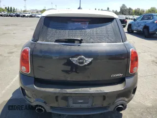 2013 MINI Countryman S ALL4 with VIN WMWZC5C52DWP30625, listed as a Copart auction lot 62772395 with 129,498 mi miles and Salvage title. Bid and sale history available at DreamBid. Image 6.