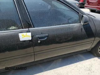 1997 Nissan Sentra XE z VIN 3N1AB41D3VL035555, wystawiony jako Copart lot #76200984 z przebiegiem 166 012 mil mil oraz Szkoda całkowita • Salvage title. Historia ofert i sprzedaży dostępna na DreamBid. Obrazek 12.