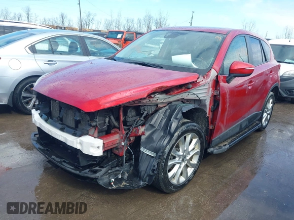 2015 Mazda CX-5 Grand Touring with VIN JM3KE4DY7F0477770, listed as a IAAI auction lot 41617849 with 106,135 mi miles. Bid and sale history available at carsss.com. Image 18.