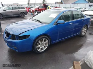 2004 Acura TSX w/Navigation with VIN JH4CL96914C021165, listed as a IAAI auction lot 41767323 with 144,071 mi miles. Bid and sale history available at carsss.com. Image 2.