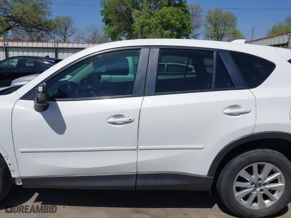 2014 Mazda CX-5 Touring with VIN JM3KE2CY2E0426164, listed as a IAAI auction lot 41812932 with 186,015 mi miles. Bid and sale history available at carsss.com. Image 15.