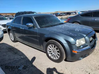 2005 Chrysler 300 with VIN 2C3AA63H35H659798, listed as a Copart auction lot 50322065 with 153,944 mi miles and Salvage Title. Bid and sale history available at carsss.com. Image 4.