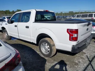 2019 Ford F-150 XL with VIN 1FTEW1C51KKC22877, listed as a IAAI auction lot 41774791 with 143,939 mi miles and . Bid and sale history available at DreamBid. Image 3.