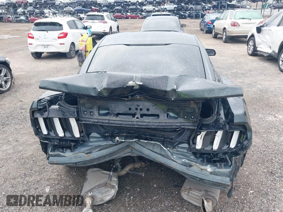 2015 Ford Mustang V6 with VIN 1FA6P8AM3F5344333, listed as a IAAI auction lot 42623531 with 121,278 mi miles and . Bid and sale history available at DreamBid. Image 16.