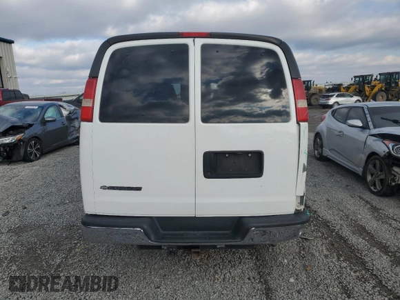 2014 Chevrolet Express Passenger LT with VIN 1GAZG1FG9E1108950, listed as a Copart auction lot 45370685 with 537,650 mi miles and Salvage title. Bid and sale history available at DreamBid. Image 6.