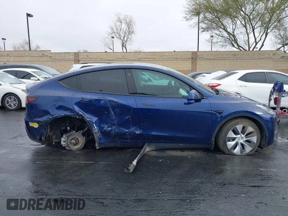 2022 Tesla Model Y Long Range with VIN 7SAYGDEE7NF409294, listed as a IAAI auction lot 41845261 with 73,116 mi miles and . Bid and sale history available at DreamBid. Image 13.