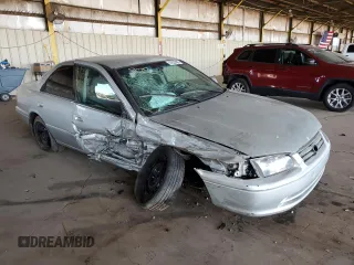2001 Toyota Camry CE z VIN 4T1BG22K11U017054, wystawiony jako Copart lot #57623485 z przebiegiem 242 217 mil mil oraz Szkoda całkowita • Salvage title. Historia ofert i sprzedaży dostępna na DreamBid. Obrazek 4.