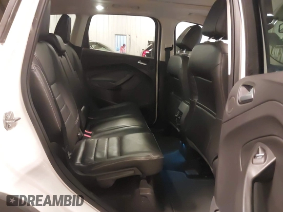 2016 Ford Escape Titanium with VIN 1FMCU9J99GUA61848, listed as a IAAI auction lot 42300324 with 51,692 mi miles and . Bid and sale history available at DreamBid. Image 8.