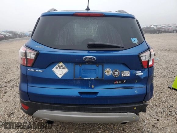 2018 Ford Escape SEL with VIN 1FMCU0HD5JUA09100, listed as a Copart auction lot 86884114 with 114,303 mi miles and Clean Title. Bid and sale history available at carsss.com. Image 6.