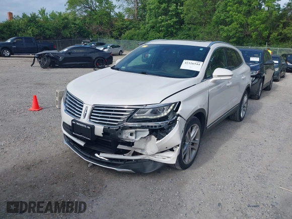 2015 Lincoln MKC z VIN 5LMCJ2A92FUJ06169, wystawiony jako IAAI lot #42326544 z przebiegiem 101 669 mil mil oraz . Historia ofert i sprzedaży dostępna na DreamBid. Obrazek 19.