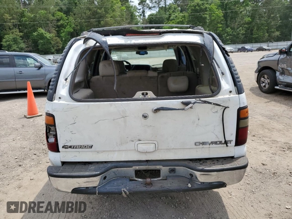 2004 Chevrolet Tahoe LT with VIN 1GNEC13Z64R252373, listed as a Copart auction lot 57138155 with 333,589 mi miles and Salvage title. Bid and sale history available at DreamBid. Image 6.