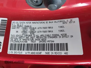 2018 Toyota Tacoma SR with VIN 3TMCZ5AN8JM141486, listed as a IAAI auction lot 42142145 with 54,851 mi miles and . Bid and sale history available at DreamBid. Image 9.