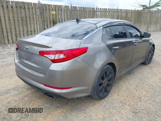 2012 Kia Optima SX with VIN 5XXGR4A6XCG077489, listed as a IAAI auction lot 42158726 with 158,229 mi miles and . Bid and sale history available at carsss.com. Image 4.
