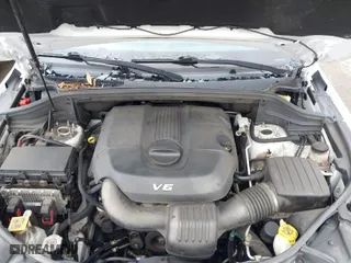2015 Jeep Grand Cherokee Altitude with VIN 1C4RJFAG4FC942885, listed as a IAAI auction lot 41952356 with 233,276 mi miles. Bid and sale history available at carsss.com. Image 10.