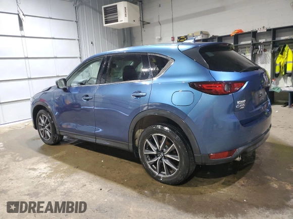 2018 Mazda CX-5 Grand Touring with VIN JM3KFBDM1J0304706, listed as a Copart auction lot 46123415 with 104,004 mi miles and Salvage title. Bid and sale history available at DreamBid. Image 2.