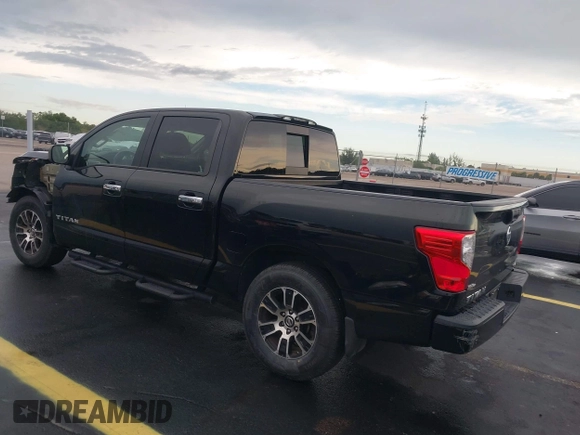 2021 Nissan Titan SV with VIN 1N6AA1EF4MN503458, listed as a IAAI auction lot 42401074 with 53,558 mi miles and . Bid and sale history available at DreamBid. Image 3.
