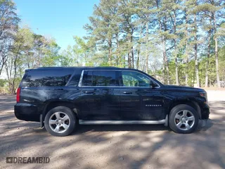 2015 Chevrolet Suburban LT with VIN 1GNSKJKC0FR238524, listed as a IAAI auction lot 42046889 with 179,676 mi miles. Bid and sale history available at carsss.com. Image 13.