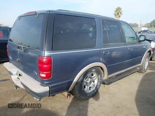 1998 Ford Expedition XLT with VIN 1FMRU17L5WLA66306, listed as a IAAI auction lot 41145712 with 93,966 mi miles. Bid and sale history available at carsss.com. Image 4.
