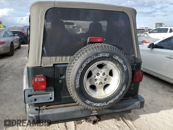 2003 Jeep Wrangler Sport with VIN 1J4FA49S43P301542, listed as a Copart auction lot 75704824 with Not Provided miles and Salvage Title. Bid and sale history available at carsss.com. Image 6.