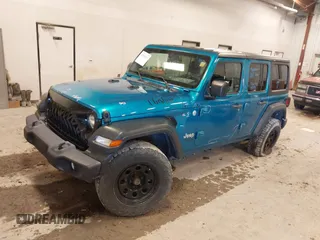 2019 Jeep Wrangler Unlimited Sport Altitude with VIN 1C4HJXDG0KW617379, listed as a IAAI auction lot 42005517 with 91,296 mi miles and . Bid and sale history available at DreamBid. Image 2.