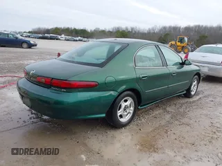 1999 Mercury Sable GS with VIN 1MEFM50U5XG633589, listed as a IAAI auction lot 41614442 with 241,833 mi miles. Bid and sale history available at carsss.com. Image 4.