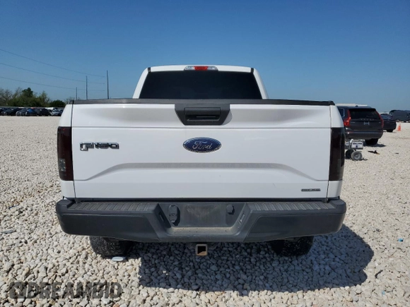 2015 Ford F-150 XLT w/HD Payload Pkg with VIN 1FTFW1EG6FFA02457, listed as a Copart auction lot 52121515 with 242,747 mi miles and Salvage Title. Bid and sale history available at carsss.com. Image 6.