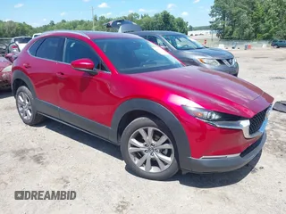 2022 Mazda CX-30 S Premium with VIN 3MVDMBDL2NM413756, listed as a IAAI auction lot 42508365 with 57,954 mi miles and . Bid and sale history available at DreamBid. Image 1.