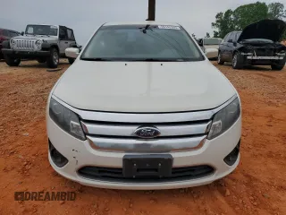 2012 Ford Fusion SE z VIN 3FAHP0HAXCR132060, wystawiony jako Copart lot #56148395 z przebiegiem 172 160 mil mil oraz Czysty tytuł • Clean title. Historia ofert i sprzedaży dostępna na DreamBid. Obrazek 5.