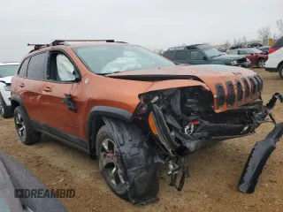 2015 Jeep Cherokee Trailhawk z VIN 1C4PJMBS7FW704980, wystawiony jako Copart lot #70334472 z przebiegiem 127 562 mil mil oraz Szkoda całkowita • Salvage title. Historia ofert i sprzedaży dostępna na DreamBid. Obrazek 4.