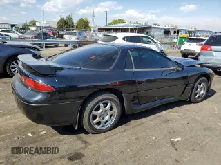 1995 Mitsubishi 3000GT z VIN JA3AM54J6SY013766, wystawiony jako Copart lot #75465424 z przebiegiem 103 869 mil mil oraz Szkoda całkowita • Salvage title. Historia ofert i sprzedaży dostępna na DreamBid. Obrazek 3.