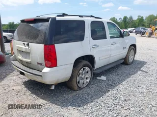 2011 GMC Yukon SLT with VIN 1GKS1CE0XBR156954, listed as a IAAI auction lot 42096120 with 288,142 mi miles. Bid and sale history available at carsss.com. Image 4.