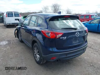 2015 Mazda CX-5 Sport with VIN JM3KE4BY3F0503011, listed as a IAAI auction lot 41973501 with 191,064 mi miles and . Bid and sale history available at carsss.com. Image 3.