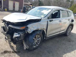 2019 Hyundai Santa Fe SE z VIN 5NMS2CAD5KH115511, wystawiony jako IAAI lot #42017668 z przebiegiem 91 584 mil mil oraz . Historia ofert i sprzedaży dostępna na DreamBid. Obrazek 2.