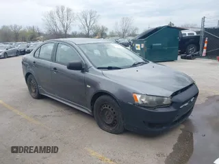 2010 Mitsubishi Lancer DE with VIN JA32U1FU7AU005962, listed as a IAAI auction lot 41927652 with 218,829 mi miles. Bid and sale history available at carsss.com. Image 1.