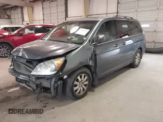 2010 Honda Odyssey EX-L with VIN 5FNRL3H7XAB080170, listed as a IAAI auction lot 41241879 with 221,272 mi miles. Bid and sale history available at carsss.com. Image 2.